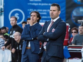 Montreal Impact head coach Mauro Biello, left, and Toronto FC head coach Greg Vanney watch their respective teams from the sidelines during first half of the first leg of the Canadian Championship soccer final action, in Montreal on Wednesday, June 21, 2017. THE CANADIAN PRESS/Paul Chiasson ORG XMIT: pch109  Mauro Biello Greg Vanney