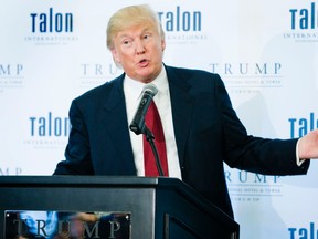 Donald Trump speaks during the ribbon cutting ceremony of the Trump International Hotel and Tower in Toronto on April 16, 2012. (Ernest Doroszuk/TORONTO SUN)