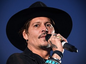 Johnny Depp introducing his film 'The Libertine' at the 'Cineramageddon' drive-in Glastonbury Festival. (James Gourley/REX/Shutterstock)