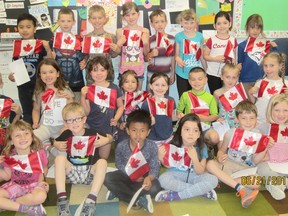 Lucknow Lions recently brought some 'Canadian Pride' to local public schools, presenting Grade 1 students with Canadian flags. Back L-R: Matthew Tuazon, Jack Maize, Jay Vermeltfoort, Rianna Pentland, Jordan Cooper, Rylan Wheeler, Gracie Baxter, and Cassidy Hill. Centre: Deklan Fenton, Layla Andrew, Paige Ireland, Mikaela Bongertman, Olivia Mabon, Mathew McLennan, Chloe Kerr, and Scarlet Goode. Front: Chloe Riddiough-Nicholson, Ronan Knoop, Denice Bugayong, Zarah Baxter, Derk Askes and Reese Todd.
