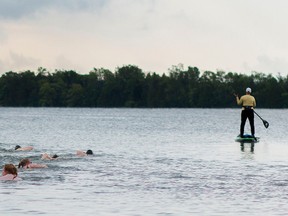 TAYLOR BERTELINK PHOTOS/For The Intelligencer
Thirteen swimmers joined together to push their physical limits by swimming across Roblin Lake in Ameliasburg and to raise money for the Strong Kids campaign.