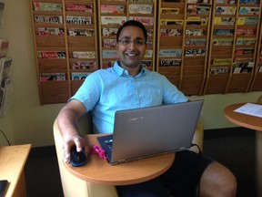 Patron Haniel Davy enjoys the new fibre Internet speeds at the John Kenneth Galbraith Reference Library in Dutton. Davy spends his summers in Dutton visiting family and frequents the library to access Wi-Fi for work.