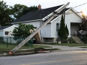 A photo via Twitter from Bluewater Power shows a hydro pole damaged on the weekend in Point Edward. The local electricity utility said 25 hydro, streetlight and signal light poles in its system have been damaged by vehicles so far this year. That compares to only a dozen damaged poles in all of 2016. (Handout/Sarnia Observer/Postmedia Network)