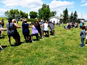 Tug-of-war matches were held at St. Michael's track and field day. Teachers and students squared off for the final match.