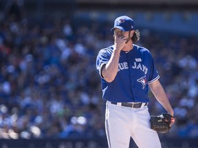 Toronto Blue Jays relief pitcher Jason Grilli reacts as he stands on the mound during eighth inning American League MLB action against the New York Yankees in Toronto on June 3, 2017. (THE CANADIAN PRESS/Chris Young)