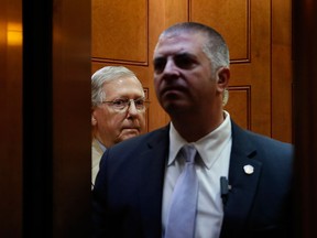 U.S. Senate Majority Leader Mitch McConnell of Ky., looks out after boarding an elevator Capitol Hill in Washington, Monday, June 26, 2017.  (AP Photo/Carolyn Kaster)