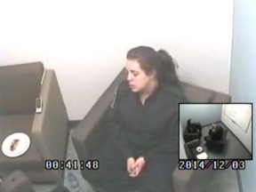 A screengrab of Stefanie McClelland being interviewed by RCMP investigator Rene Desfosses after her arrest on Dec. 2, 2014. (Video screenshot)