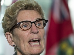 Premier Kathleen Wynne speaks during an event in Toronto on Wednesday, June 14, 2017. (CRAIG ROBERTSON/TORONTO SUN)