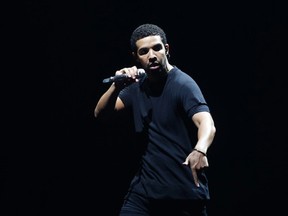 Toronto's Drake performs during OVO Fest in Toronto on Monday, Aug. 4, 2014. (JACK BOLAND/TORONTO SUN)
