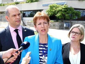 Nickel Belt MPP France Gelinas, middle, makes a point as Sudbury NDP candidate Jamie West and Ontario NDP leader Andrea Horwath look on during a press conference on Tuesday. (John Lappa/Sudbury Star)