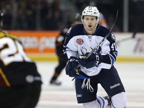 Manitoba Moose winger Kyle Connor gets after the puck during AHL action against the Cleveland Monsters at MTS Centre in Winnipeg on Dec. 10, 2016. (Kevin King/Winnipeg Sun/Postmedia Network)