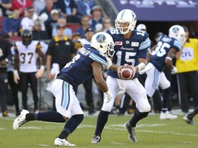 Every team in the CFL knows that the key to beating the Argos is getting to QB Ricky Ray (right). Of course, the Argos know that they know, which is why the O-line has upped its game. (Jack Boland/Toronto Sun)