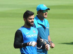 India’s national team has been the subject of some controversy after the departure of coach Anil Kumble (right) because of tension with captain Virat Kohli. (AP)