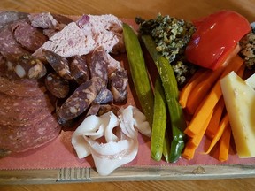 charcuterie board is skimpy and too small for the price.