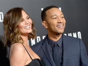 Model Chrissy Teigen (L) and actor/singer/executive producer John Legend attend WGN America's 'Underground' Season Two Premiere Screening at Regency Village Theatre on March 1, 2017 in Westwood, California. (Photo by Charley Gallay/Getty Images for WGN America)