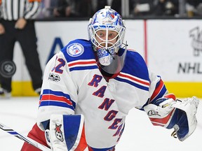 In this March 25, 2017, file photo, New York Rangers goalie Antti Raanta, of Finland, deflects a shot during the second period of the team's NHL hockey game against the Los Angeles Kings in Los Angeles. (AP Photo/Mark J. Terrill, File)