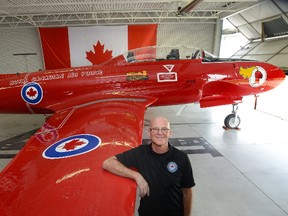 Simon Pont shows off a CT-133 Silver Star jet trainer ? restored thanks to 1,200 hours of volunteer labour ? which goes on display to the public today at London?s Jet Aircraft Museum. (MORRIS LAMONT, The London Free Press)