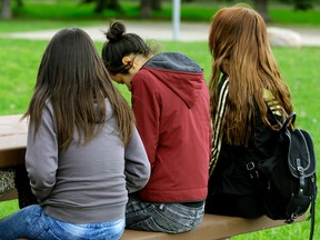 Alberta Education publicly tracks many statistics about the province's schools. Numbers tied to suspensions and expulsions are not among them, so the Journal asked Edmonton's public and Catholic school boards for the information. These three teen girls say their school suspends students for "ridiculous" reasons. Larry Wong/Postmedia