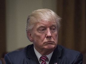 U.S. President Donald Trump listens as he meets with immigration crime victims to urge passage of House legislation to save American lives, in the Cabinet Room at the White House on June 28, 2017 in Washington, D.C. (Molly Riley-Pool/Getty Images)