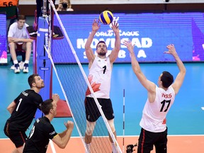 Londoner TJ Sanders sets up a teammate during FIVB World League action. (Photo courtesy FIVB)