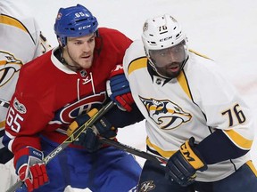 Belleville native Andrew Shaw and former Belleville Bulls defenceman P.K. Subban tangle during an NHL game last season between the Montreal Canadiens and Nashville Predators. (Postmedia Netowrk)