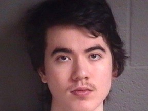 This undated booking photo provided by Buncombe County Detention Facility, shows North Carolina resident Justin Nojan Sullivan, who was sentenced to life in prison on Tuesday, June 27, 2017, for a foiled terror plot inspired by the Islamic State group. (Buncombe County Detention Facility via AP)