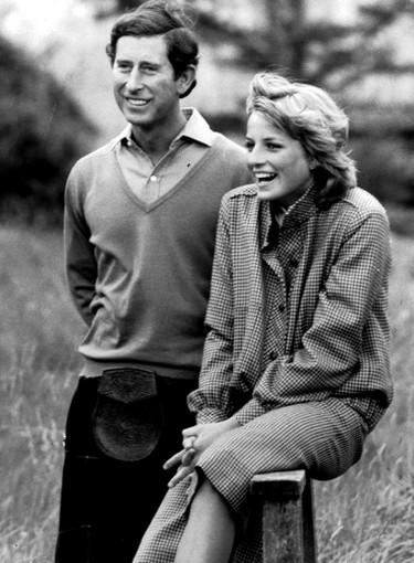 Charles and Diana pose for photographers after their marriage.