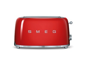 Smeg?s retro style 4-slice toaster comes in an array of playful hues, including red, pink, blue and cream. (West Elm via AP)