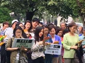 Supporters of Pastor Hyeon Soo Lim gather at a rally at Mel Lastman Square on June 29, 2017. They want Prime Minister Justin Trudeau to help free the church minister from a North Korean prison camp and bring him home to Canada. (Joe Warmington/Toronto Sun)
