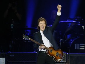 British musician and former Beatles' member Paul McCartney performs on June 11, 2015 at the Stade de France in Saint-Denis near Paris. (Patrick Kovarik/AFP/Getty Images)