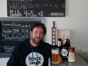 Ryan Stokes helped launch Black Swan Brewery on Downie Street with fellow teacher Bruce Pepper after years of home brewing and recipe tinkering.  (WAYNE NEWTON/Special to The London Free Press)
