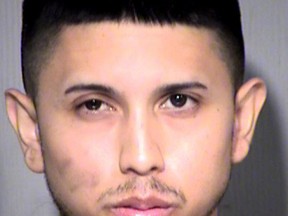 This undated file booking photo provided by the Maricopa County Sheriff's Office shows Aaron Juan Saucedo.   (Maricopa County Sheriff's Office via AP, File)