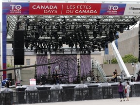 Getting ready for Canada Days celebrations this weekend at Toronto City Hall.(MICHAEL PEAKE, Toronto Sun)