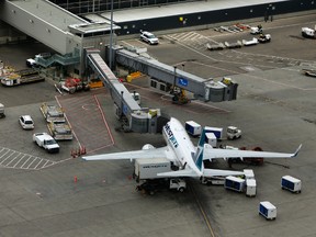 A WestJet 737 is seen at a gate at Edmonton International Airport (EIA) on Tuesday Oct, 1, 2013. Tom Braid/Postmedia