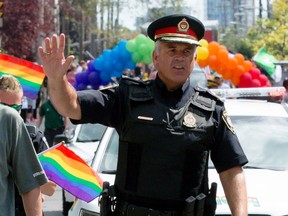 Ottawa Police Chief Charles Bordeleau waved to the crowd during the 2015 Ottawa Capital Pride Parade.
