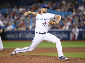 Glenn Sparkman of the Toronto Blue Jays delivers a pitch in the eleventh inning during MLB game action against the Boston Red Sox at Rogers Centre on June 30, 2017. (TOM SZCZERBOWSKI/Getty Images)