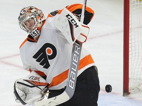 Steve Mason makes a stop in the second period as the Ottawa Senators take on the Philadelphia Flyers in NHL action at Canadian Tire Centre in Ottawa on Dec. 1, 2016. On July 1, 2017, Mason signed a free-agent deal with the Winnipeg Jets for two years and carries an average value of $4.1 million. Wayne Cuddington/ Postmedia