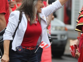 MPP Sophie Kiwala in the Canada Day People Parade in Kingston, Ont. on Saturday July 1, 2017. Steph Crosier/Kingston Whig-Standard/Postmedia Network