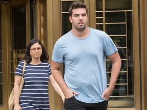 Billy McFarland, right, leaves federal court with his attorney Sabrina Shroff after his arraignment, Saturday, July 1, 2017, in New York. (AP Photo/Mary Altaffer)