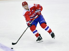 In this March 23, 2017, file photo, Washington Capitals defenseman Kevin Shattenkirk (22) passes the puck during the third period of an NHL hockey game against the Columbus Blue Jackets in Washington. The New York Rangers have signed the top free agent on the market, defenseman Kevin Shattenkirk, on Saturday, july 1, 2017. (AP Photo/Nick Wass, File)