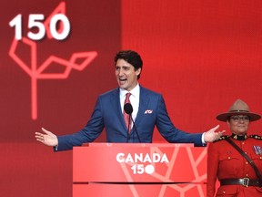 Prime Minister Justin Trudeau speaks during the Canada Day noon hour show on Parliament Hill in Ottawa on Saturday, July 1, 2017. THE CANADIAN PRESS/Justin Tang