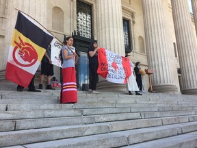 A group of Indigenous individuals held a rally at the Manitoba Legislature in Winnipeg on Saturday, July 1, 2017, during Canada Day to remind Canadians that there is still much work to be done when it comes to reconciliation with Indigenous people. JASON FRIESEN/Winnipeg Sun/Postmedia Network