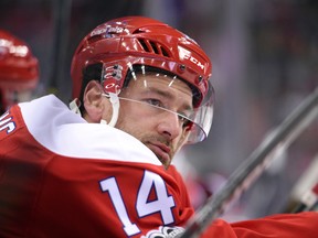 In this Jan. 13, 2017, file photo, Washington Capitals right wing Justin Williams (14) looks on during the third period of an NHL hockey game against the Chicago Blackhawks in Washington. The Carolina Hurricanes opened free agency Saturday, Jauly 1, 2017, by bringing back 35-year-old forward Justin Williams on a two-year deal worth $9 million. (AP Photo/Nick Wass, File)