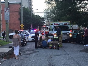 Paramedics and police at the scene of a collision at the corner of Frank and O'connor on Saturday evening.