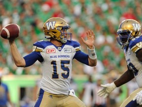 Blue Bombers quarterback Matt Nichols (left) went 23-36, throwing for 331 yards and four touchdowns last night against the Roughriders.(The Canadian Press)