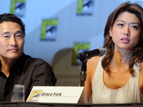 Daniel Dae Kim and Grace Park speak during the "Hawaii Five-0" panel discussion during Comic-Con 2010 at San Diego Convention Center on July 23, 2010 in San Diego, Calif.  (Frazer Harrison/Getty Images)