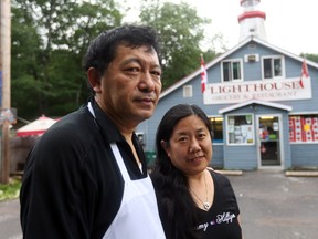 Sandy Zhang and husband and store owner Honggao Ji in Constance Bay, on June 31.