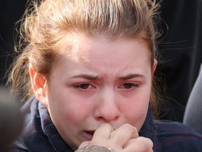 Cheyenne Dunbar, mother of Hailey Dunbar-Blanchette who was murdered along with her father Terry Blanchette, speaks briefly to media in Blairmore, Ab., on Wednesday, September 16, 2015. Mike Drew/Calgary Sun/Postmedia Network