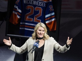 Hayley Wickenheiser speaks during a pregame ceremony  at Rogers Place honouring her after announcing her retirement from hockey.