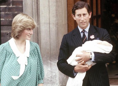 In this June 22, 1982, file photo, Britain's Prince Charles, Prince of Wales, and wife Princess Diana take home their newborn son Prince William, as they leave St. Mary's Hospital in London. (AP Photo/John Redman, File)